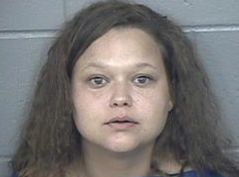 Mom accused of decapitating 6-year-old child and dog claims devil was  trying to attack her | The Independent